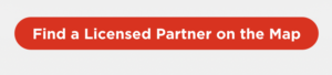 red button with text "find a licensed partner on the map"
